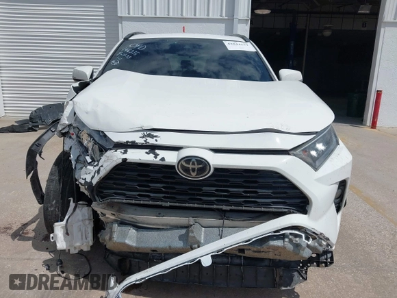2019 Toyota RAV4 XLE with VIN 2T3W1RFVXKW033696, listed as a IAAI auction lot 42044151 with 126,872 mi miles and . Bid and sale history available at DreamBid. Image 13.