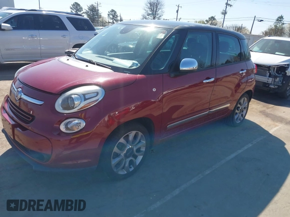 2014 FIAT 500L Lounge with VIN ZFBCFACH1EZ022517, listed as a IAAI auction lot 41783768 with 100,797 mi miles and . Bid and sale history available at DreamBid. Image 2.