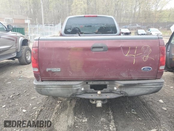 1998 Ford F-150 with VIN 1FTZX1727WNB55284, listed as a Copart auction lot 51781465 with 258,600 mi miles and Salvage title. Bid and sale history available at DreamBid. Image 6.