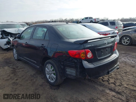 2009 Toyota Corolla with VIN 2T1BU40E29C124161, listed as a IAAI auction lot 41091324 with 128,310 mi miles. Bid and sale history available at carsss.com. Image 3.