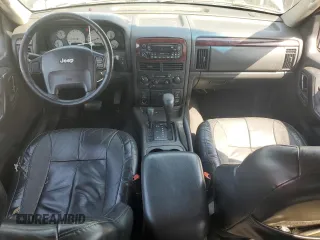 2002 Jeep Grand Cherokee Limited with VIN 1J8GW58NX2C158544, listed as a Copart auction lot 54937665 with 259,089 mi miles and Salvage title. Bid and sale history available at DreamBid. Image 8.