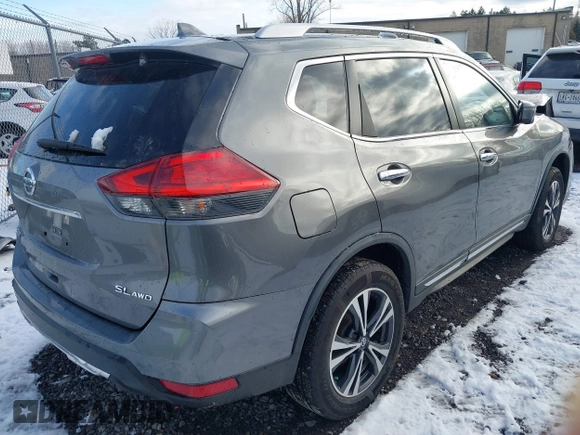 2017 Nissan Rogue SL with VIN JN8AT2MV7HW271485, listed as a IAAI auction lot 41100772 with 106,965 mi miles. Bid and sale history available at carsss.com. Image 4.