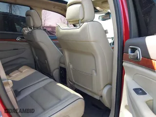 2011 Jeep Grand Cherokee Overland with VIN 1J4RR6GT7BC551649, listed as a IAAI auction lot 41897267 with 82,034 mi miles. Bid and sale history available at carsss.com. Image 8.