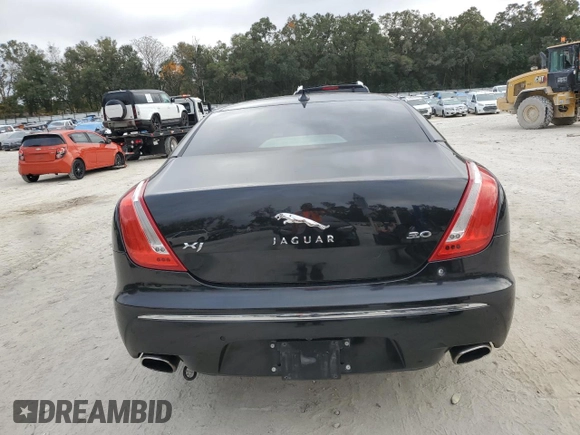 2013 Jaguar XJ с VIN SAJWA1C77D8V50441, выставлен на аукционе Copart как лот 85317664 с пробегом 132 183 миль миль и Чистый • Clean title. История ставок и продаж доступна на DreamBid. Изображение 6.