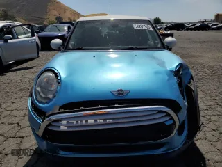 2015 MINI Hardtop 4 Door z VIN WMWXS5C5XFT827473, wystawiony jako Copart lot #58261135 z przebiegiem 75 439 mil mil oraz Szkoda całkowita • Salvage title. Historia ofert i sprzedaży dostępna na DreamBid. Obrazek 5.