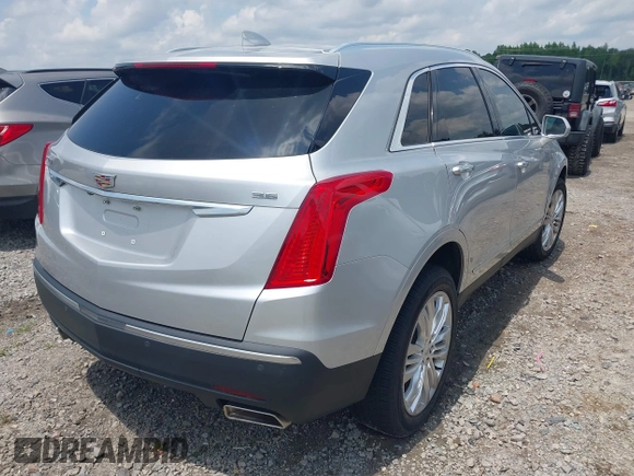 2018 Cadillac XT5 FWD with VIN 1GYKNARS4JZ142654, listed as a IAAI auction lot 42275794 with 112,790 mi miles and . Bid and sale history available at DreamBid. Image 4.