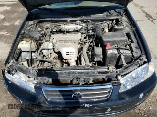 2000 Toyota Camry CE z VIN 4T1BG22K0YU699662, wystawiony jako Copart lot #47949165 z przebiegiem 270 179 mil mil oraz Szkoda całkowita • Salvage title. Historia ofert i sprzedaży dostępna na DreamBid. Obrazek 11.