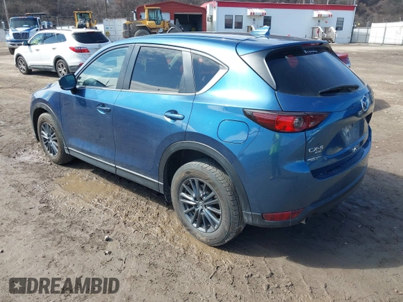 2021 Mazda CX-5 Touring with VIN JM3KFBCM4M0404093, listed as a IAAI auction lot 41751343 with 50,536 mi miles. Bid and sale history available at carsss.com. Image 3.