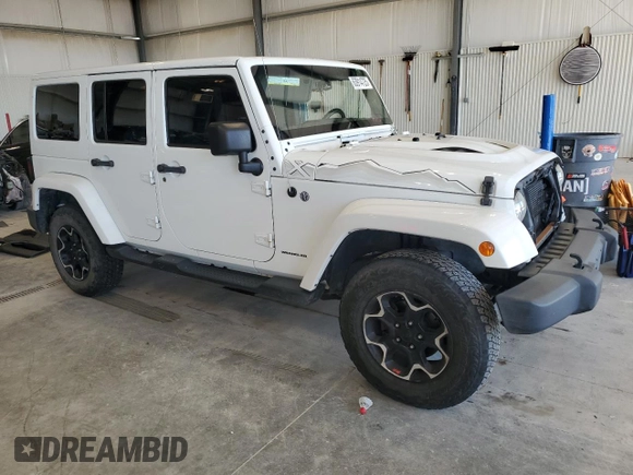 2015 Jeep Wrangler Unlimited Sahara with VIN 1C4BJWEG2FL620001, listed as a Copart auction lot 63914725 with 114,810 mi miles and Salvage title. Bid and sale history available at DreamBid. Image 4.