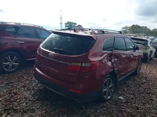 2014 Hyundai Santa Fe Limited with VIN KM8SN4HF9EU058002, listed as a IAAI auction lot 40785983 with 1 mi miles. Bid and sale history available at carsss.com. Image 4.