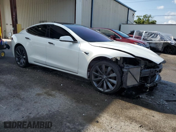 2017 Tesla Model S 100D z VIN 5YJSA1E21HF229936, wystawiony jako Copart lot #54734955 z przebiegiem 125 511 mil mil oraz Szkoda całkowita • Salvage title. Historia ofert i sprzedaży dostępna na DreamBid. Obrazek 4.