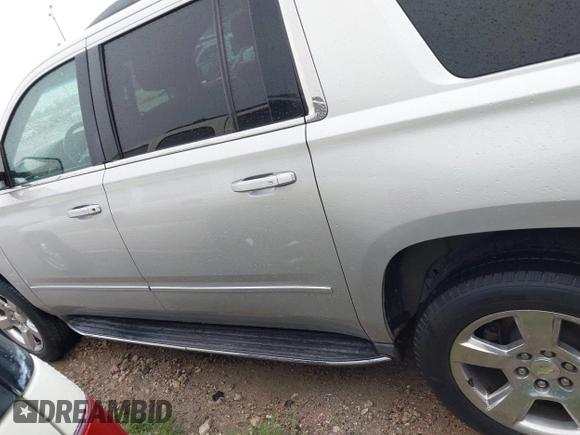 2015 Chevrolet Suburban LTZ with VIN 1GNSCKKC3FR225723, listed as a IAAI auction lot 42577863 with 267,557 mi miles and . Bid and sale history available at DreamBid. Image 14.