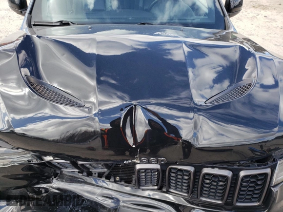2019 Jeep Grand Cherokee Limited with VIN 1C4RJFBG3KC773516, listed as a Copart auction lot 50217205 with 58,391 mi miles and Salvage Title. Bid and sale history available at carsss.com. Image 12.