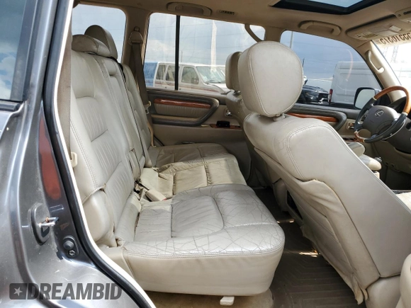2003 Lexus LX 470 z VIN JTJHT00W733523370, wystawiony jako Copart lot #55516375 z przebiegiem 157 862 mil mil oraz Czysty tytuł • Clean title. Historia ofert i sprzedaży dostępna na DreamBid. Obrazek 11.
