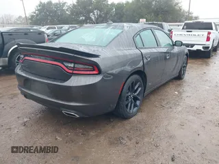 2023 Dodge Charger SXT with VIN 2C3CDXBG8PH566020, listed as a IAAI auction lot 41433879 with 22,187 mi miles and . Bid and sale history available at DreamBid. Image 4.
