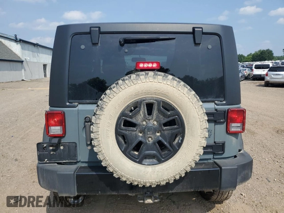 2015 Jeep Wrangler Willys Wheeler z VIN 1C4AJWAG2FL647913, wystawiony jako Copart lot #63986705 z przebiegiem 111 426 mil mil oraz Czysty tytuł • Clean title. Historia ofert i sprzedaży dostępna na DreamBid. Obrazek 6.