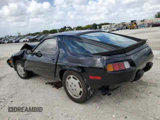 1985 Porsche 928 z VIN WP0JB0921FS861994, wystawiony jako Copart lot #77976744 z przebiegiem 65 048 mil mil oraz Nie do naprawy. Historia ofert i sprzedaży dostępna na DreamBid. Obrazek 2.