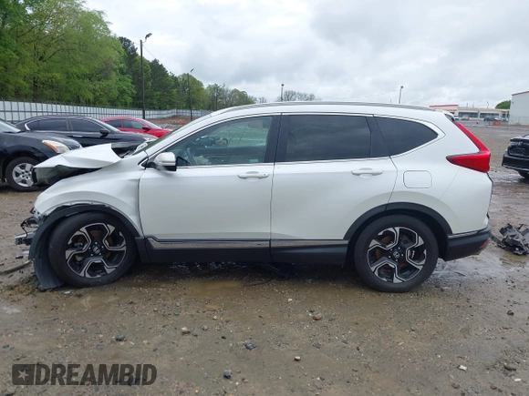 2018 Honda CR-V Touring z VIN 5J6RW1H96JL014087, wystawiony jako IAAI lot #41931640 z przebiegiem Nie podano mil oraz . Historia ofert i sprzedaży dostępna na DreamBid. Obrazek 15.