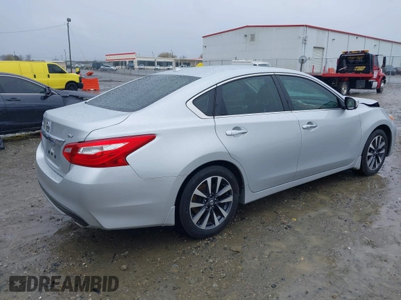 2016 Nissan Altima SV with VIN 1N4AL3AP5GC192300, listed as a IAAI auction lot 41765314 with 162,671 mi miles and . Bid and sale history available at DreamBid. Image 4.