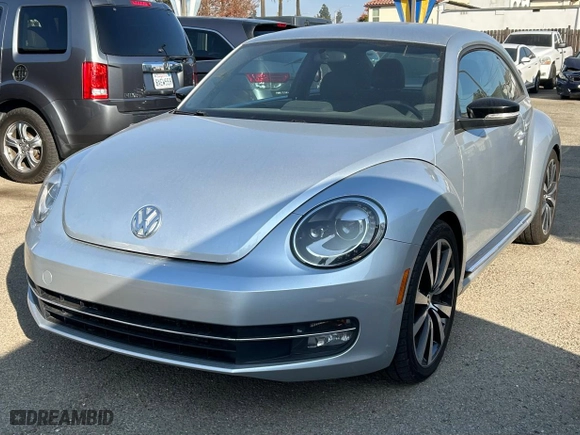 2012 Volkswagen Beetle 2.0T Turbo with VIN 3VW467AT8CM650890, listed as a Copart auction lot 83903324 with 105,476 mi miles and Clean Title. Bid and sale history available at carsss.com. Image 2.