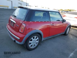 2004 MINI Hardtop with VIN WMWRC33474TJ53569, listed as a Copart auction lot 72429454 with 154,713 mi miles and Salvage Title. Bid and sale history available at DreamBid. Image 3.