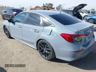 2024 Honda Civic Sport with VIN 2HGFE2F59RH562595, listed as a IAAI auction lot 41681632 with 18,217 mi miles and . Bid and sale history available at DreamBid. Image 3.
