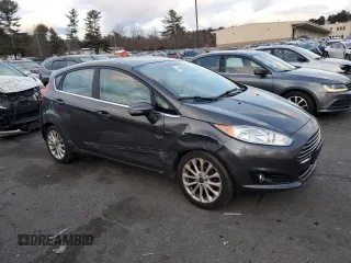 2017 Ford Fiesta Titanium with VIN 3FADP4FJ3HM109507, listed as a Copart auction lot 87182664 with 105,198 mi miles and Salvage Title. Bid and sale history available at DreamBid. Image 4.