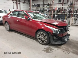 2016 Cadillac CTS Luxury Collection AWD z VIN 1G6AX5SX6G0124584, wystawiony jako IAAI lot #41235515 z przebiegiem 82 286 mil mil oraz . Historia ofert i sprzedaży dostępna na DreamBid. Obrazek 1.