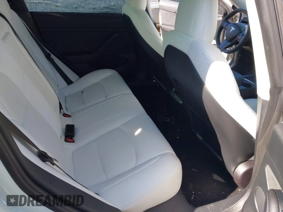 2023 Tesla Model 3 z VIN 5YJ3E1EA4PF482005, wystawiony jako IAAI lot #41363157 z przebiegiem 26 013 mil mil oraz . Historia ofert i sprzedaży dostępna na DreamBid. Obrazek 8.