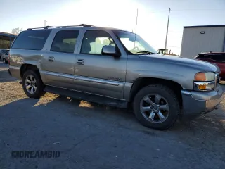 2002 GMC Yukon XL SLT with VIN 3GKFK16Z92G264823, listed as a Copart auction lot 89217375 with 243,986 mi miles and Salvage Title. Bid and sale history available at carsss.com. Image 4.