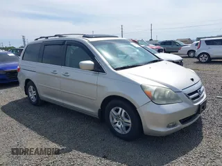 2006 Honda Odyssey EX-L z VIN 5FNRL38786B411187, wystawiony jako IAAI lot #42316075 z przebiegiem 272 658 mil mil oraz . Historia ofert i sprzedaży dostępna na DreamBid. Obrazek 1.