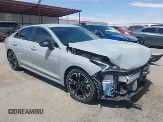 2023 Kia K5 GT-Line z VIN 5XXG64J23PG176084, wystawiony jako IAAI lot #42031383 z przebiegiem 38 398 mil mil oraz . Historia ofert i sprzedaży dostępna na DreamBid. Obrazek 1.