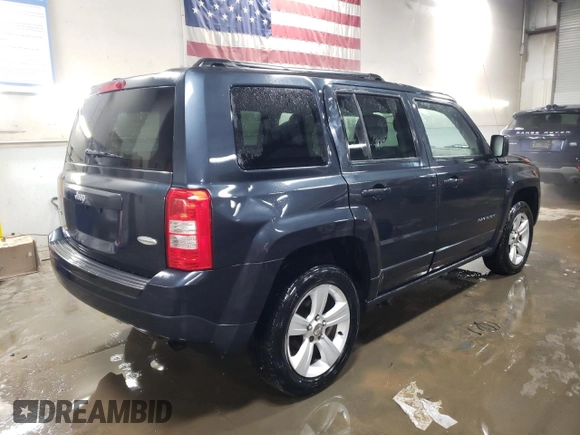 2014 Jeep Patriot Latitude with VIN 1C4NJRFB0ED588336, listed as a Copart auction lot 89391695 with 133,941 mi miles and Salvage Title. Bid and sale history available at carsss.com. Image 3.