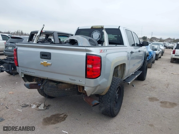 2014 Chevrolet Silverado 1500 LT with VIN 3GCUKRECXEG426462, listed as a IAAI auction lot 41599738 with 193,829 mi miles. Bid and sale history available at carsss.com. Image 4.