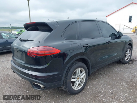 2016 Porsche Cayenne with VIN WP1AA2A28GLA10621, listed as a IAAI auction lot 42375924 with 70,815 mi miles and . Bid and sale history available at DreamBid. Image 4.