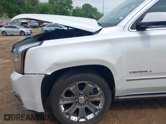 2016 GMC Yukon Denali with VIN 1GKS1CKJ7GR237852, listed as a IAAI auction lot 41944398 with 65,703 mi miles. Bid and sale history available at carsss.com. Image 18.