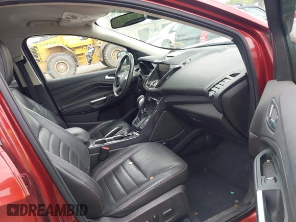 2015 Ford Escape Titanium z VIN 1FMCU9J98FUC84963, wystawiony jako IAAI lot #42469112 z przebiegiem 128 838 mil mil oraz . Historia ofert i sprzedaży dostępna na DreamBid. Obrazek 5.