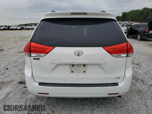 2012 Toyota Sienna LE AAS with VIN 5TDKK3DC8CS265274, listed as a Copart auction lot 54058245 with 175,063 mi miles and Salvage title. Bid and sale history available at DreamBid. Image 6.
