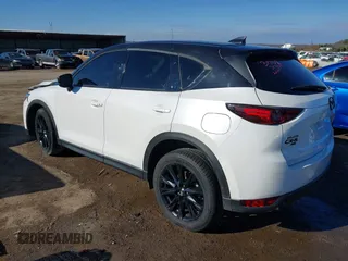 2021 Mazda CX-5 Grand Touring with VIN JM3KFBDM3M0417738, listed as a IAAI auction lot 41308123 with 90,134 mi miles. Bid and sale history available at carsss.com. Image 3.