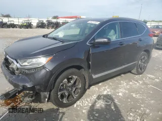 2018 Honda CR-V Touring z VIN 7FARW2H94JE077885, wystawiony jako Copart lot #55451345 z przebiegiem 133 964 mil mil oraz Szkoda całkowita • Salvage title. Historia ofert i sprzedaży dostępna na DreamBid. Obrazek 1.