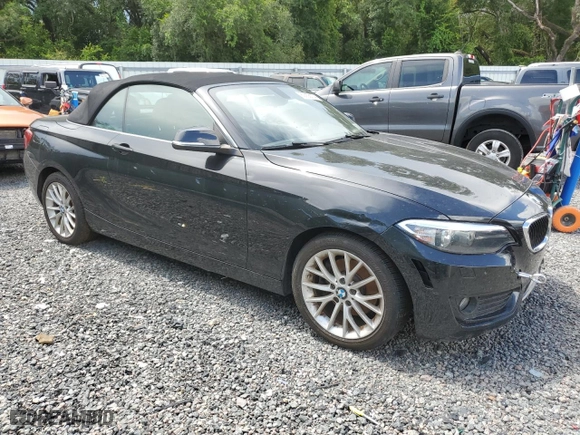 2015 BMW 2 Series 228i xDrive with VIN WBA1K7C51FV472540, listed as a Copart auction lot 63658174 with 119,567 mi miles and Salvage Title. Bid and sale history available at carsss.com. Image 4.
