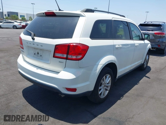 2013 Dodge Journey SXT with VIN 3C4PDCBG4DT696966, listed as a IAAI auction lot 42555632 with 144,927 mi miles and . Bid and sale history available at DreamBid. Image 4.