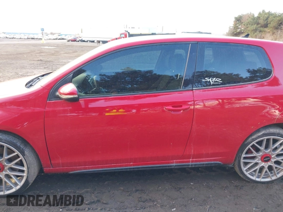 2012 Volkswagen GTI w/Conv & Sunroof z VIN WVWEV7AJ9CW292286, wystawiony jako IAAI lot #41478359 z przebiegiem 153 000 mil mil oraz . Historia ofert i sprzedaży dostępna na DreamBid. Obrazek 14.