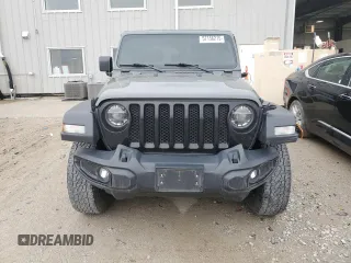 2020 Jeep Wrangler Unlimited Willys with VIN 1C4HJXDM2LW345683, listed as a Copart auction lot 57156215 with Not provided miles and Salvage title. Bid and sale history available at DreamBid. Image 5.