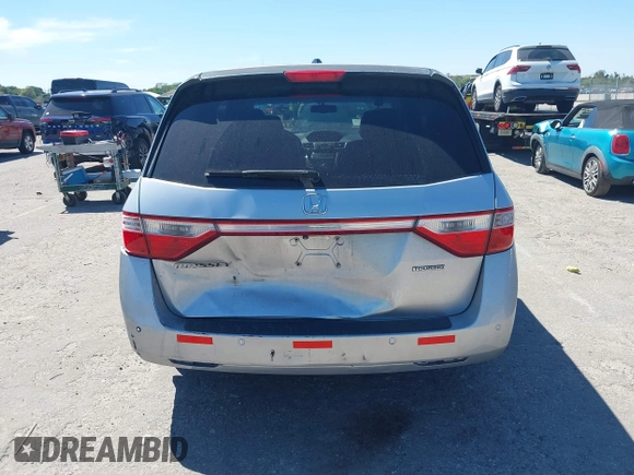 2012 Honda Odyssey Touring with VIN 5FNRL5H90CB099519, listed as a IAAI auction lot 41854550 with 185,110 mi miles. Bid and sale history available at carsss.com. Image 17.