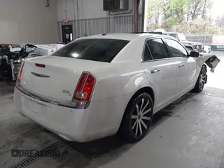 2013 Chrysler 300 with VIN 2C3CCAEG1DH576329, listed as a IAAI auction lot 41924329 with 191,602 mi miles. Bid and sale history available at carsss.com. Image 4.