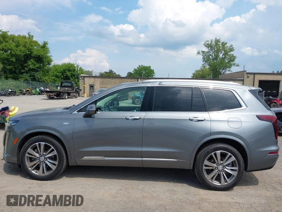 2021 Cadillac XT6 Premium Luxury with VIN 1GYKPDRS9MZ118642, listed as a IAAI auction lot 42664965 with 65,566 mi miles and . Bid and sale history available at DreamBid. Image 14.