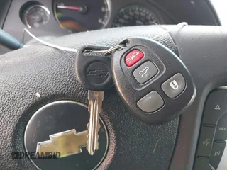 2007 Chevrolet Tahoe LT z VIN 1GNFC130X7R353412, wystawiony jako IAAI lot #42535108 z przebiegiem 78 497 mil mil oraz . Historia ofert i sprzedaży dostępna na DreamBid. Obrazek 11.