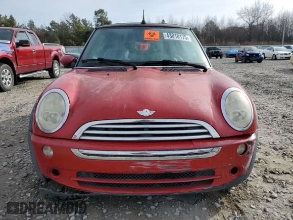 2005 MINI Convertible with VIN WMWRF33525TG12494, listed as a Copart auction lot 43010175 with Not provided miles and Salvage title. Bid and sale history available at DreamBid. Image 5.