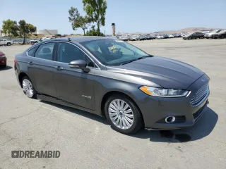 2016 Ford Fusion SE Hybrid with VIN 3FA6P0LU9GR166408, listed as a Copart auction lot 59931995 with 104,560 mi miles and Salvage title. Bid and sale history available at DreamBid. Image 4.